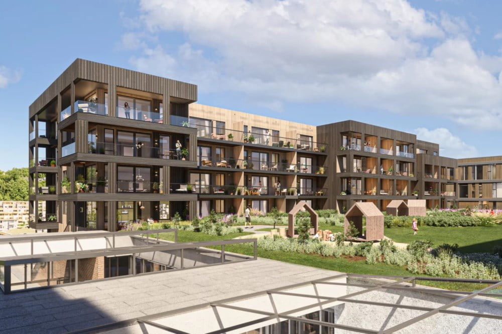 Moderne leilighetskompleks med innbydende takhage.